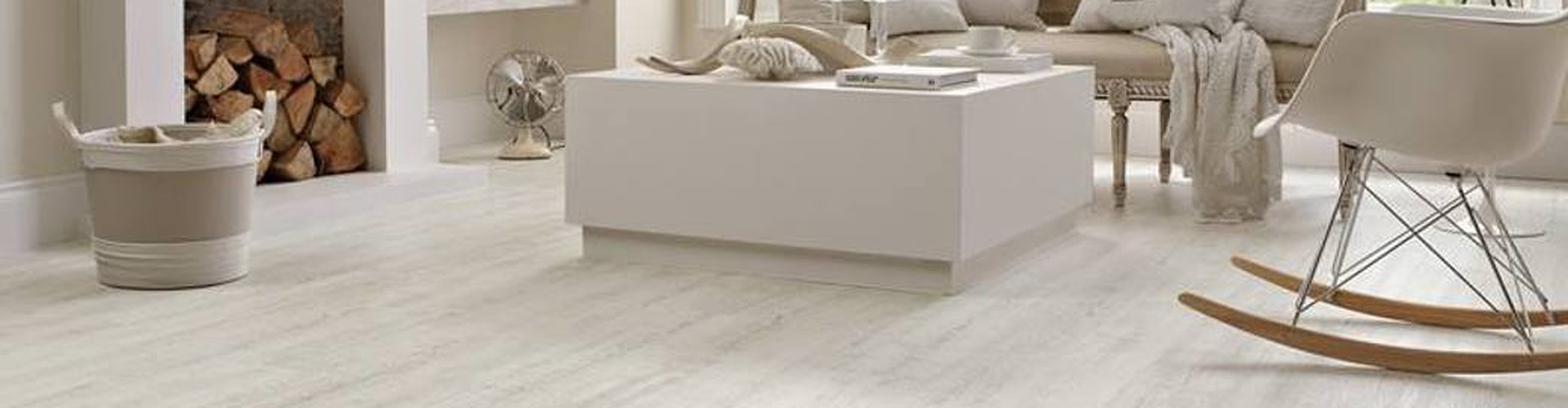 Karndean luxury vinyl plank flooring installed in a Grand Island living room — waterproof LVP with realistic white oak wood grain, available through Patina Floor and Home